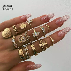 Tocona 15 Pcs/set Bohemia Women Fashion Heart Fatima Hands Virgin Mary Cross Leaf Hollow Geometric Crystal Ring Set Jewelry 7056